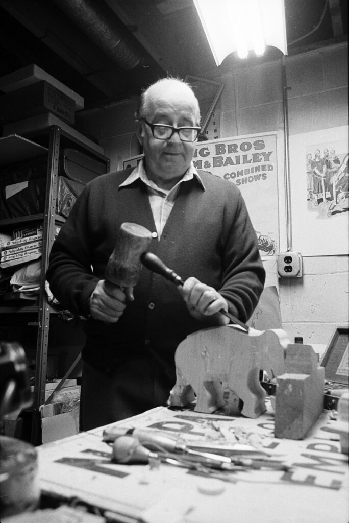 Jimmy Bashline carving wooden elephant for miniature circus in 1988. Butler Eagle file photo.